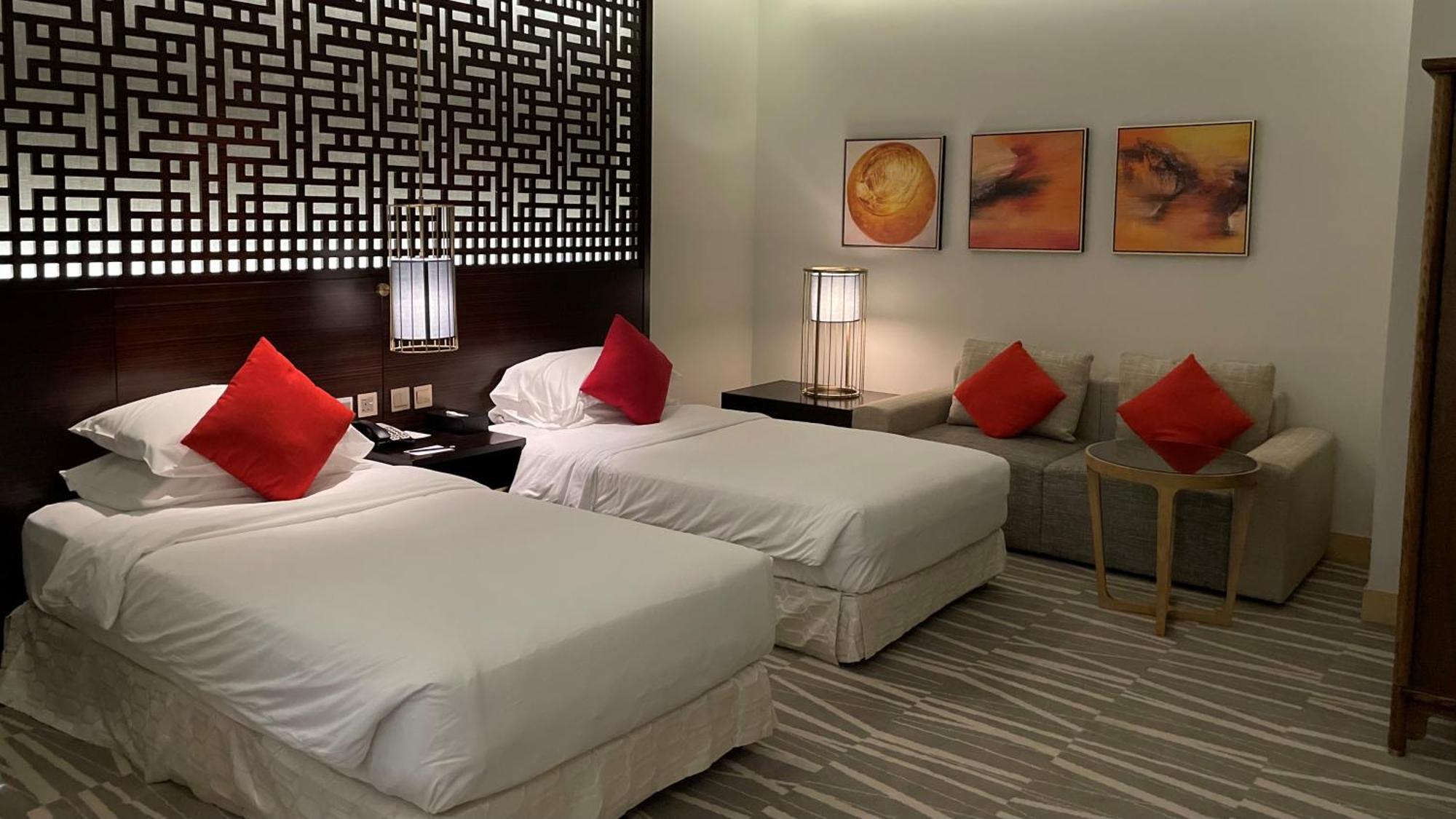 Ramada Hotel & Suites By Wyndham Al Qassim Ель-Букайрія Екстер'єр фото A room at the hotel